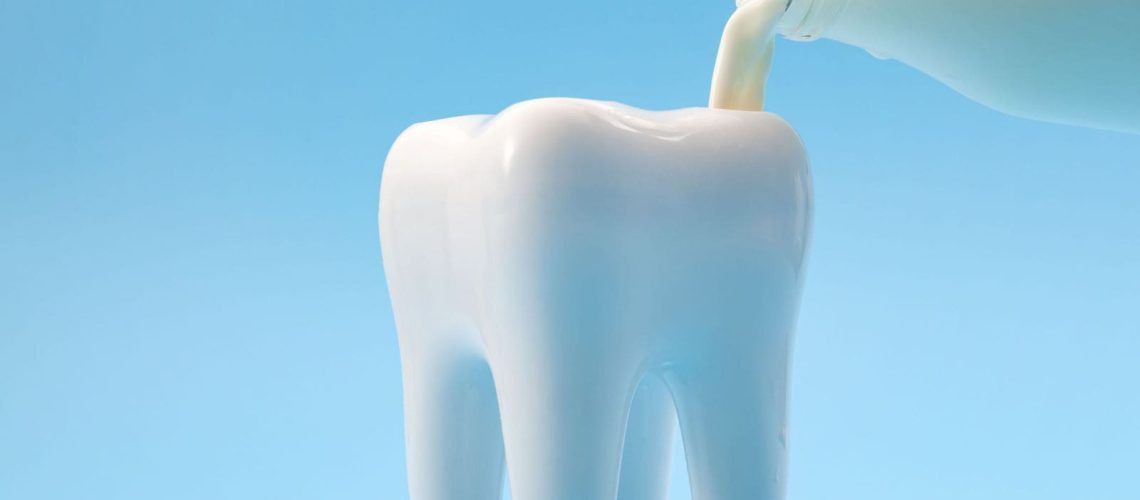 Tooth Model With Milk Pour