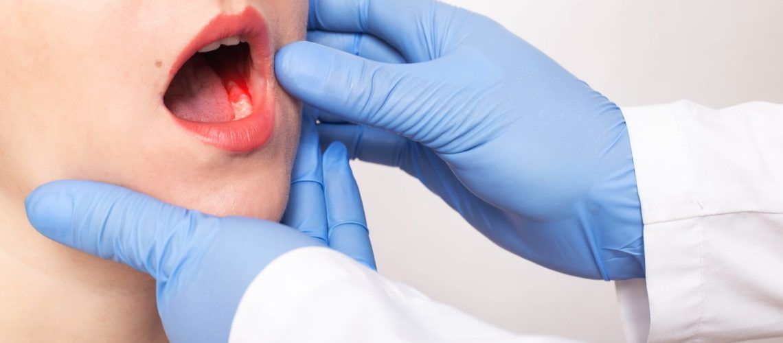 Woman Recieving Dental Exam