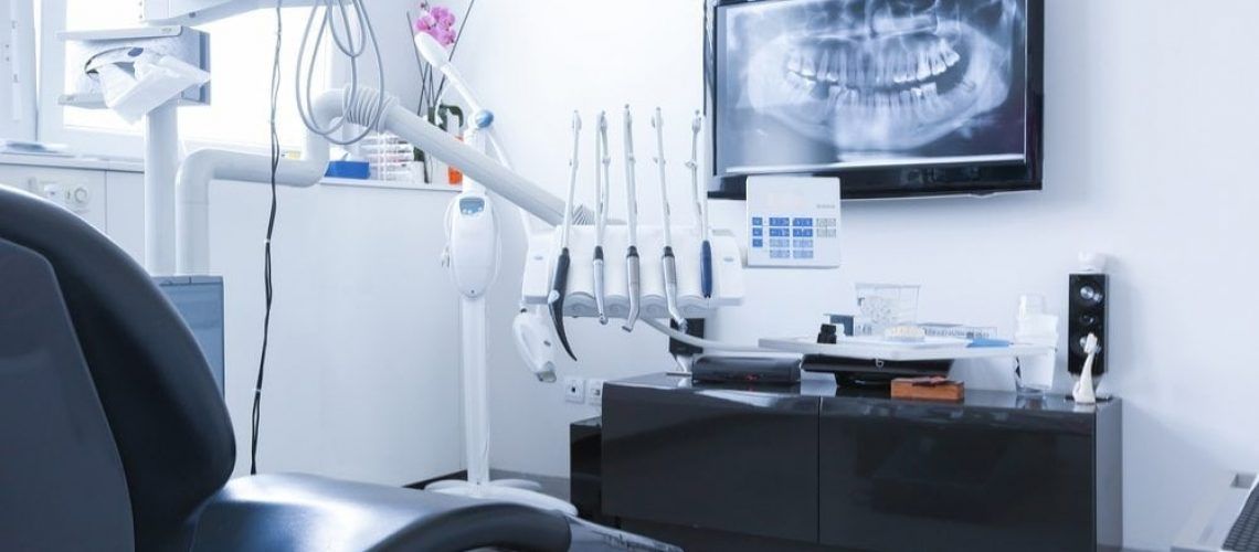 Modern Dental work station showing dental x rays, and equipment