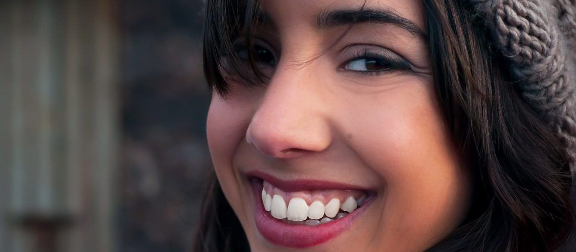 Young Woman Smiling At Camera